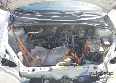 2001 Toyota Echo из США, поврежденный, VIN JTDBT123010137177